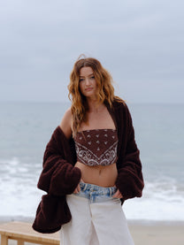 Dark Chocolate Crop Papàsweater modeled on the beach