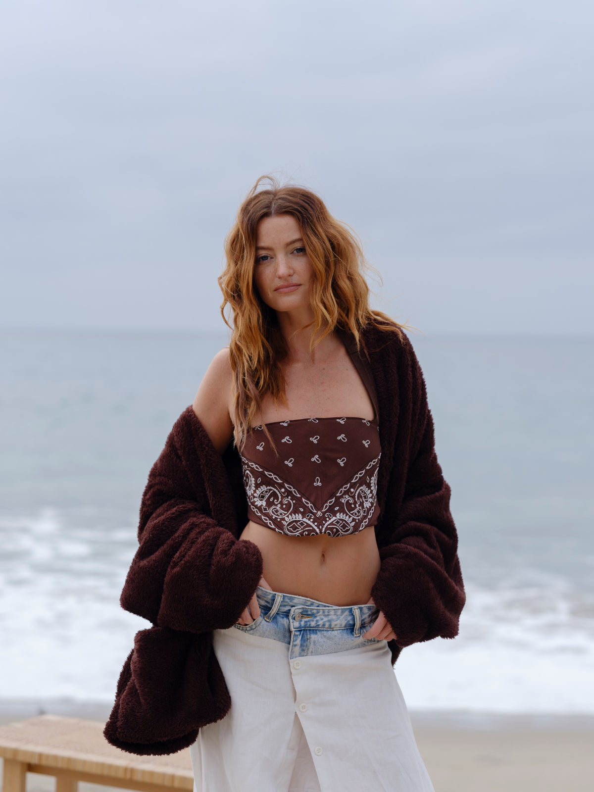 Dark Chocolate Crop Papàsweater modeled on the beach