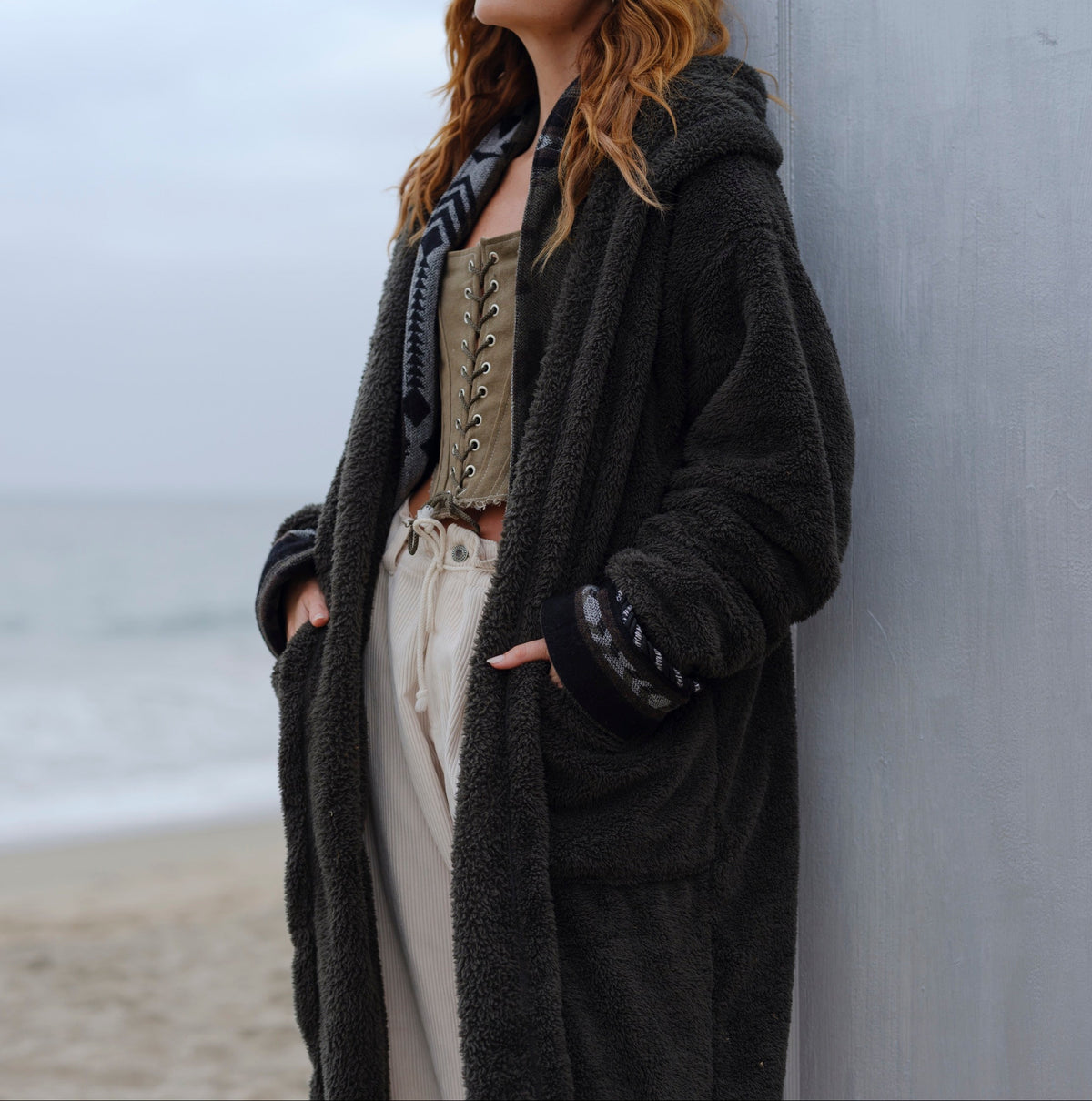 Pacific Pine Long Papàsweater modeled on the beach