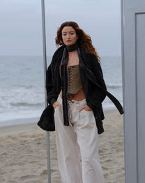 Pacific Pine Mid Papàsweater modeled on the beach