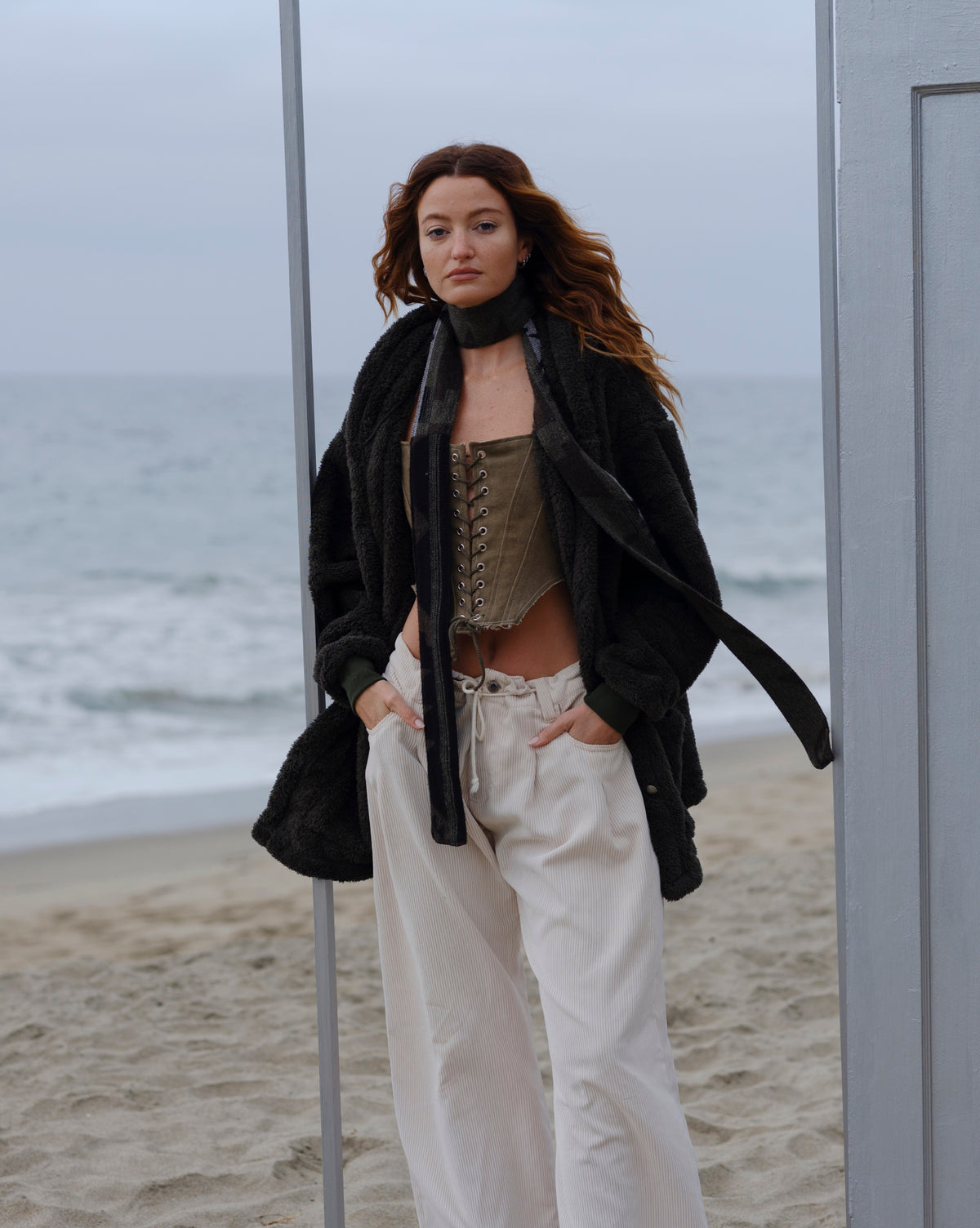 Pacific Pine Mid Papàsweater modeled on the beach