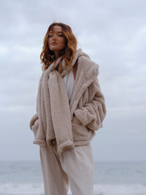Sheep Crop Papàsweater worn open on the beach