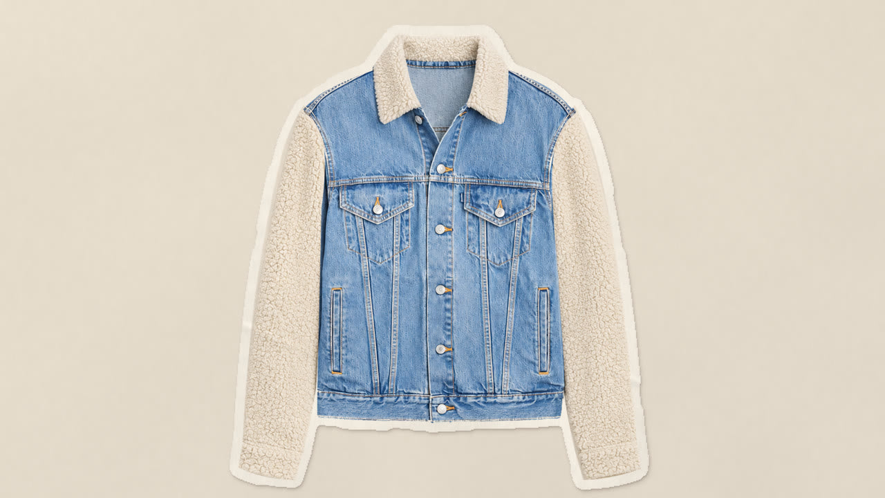 A vintage denim jacket customized with a sherpa collar and sleeves, presented as a paper cutout